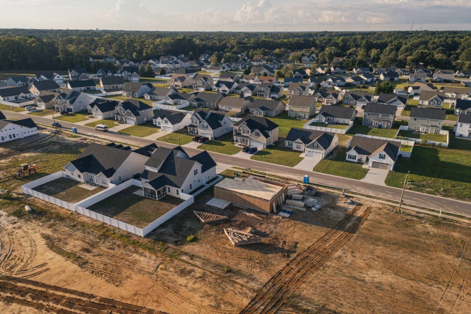Suburban neighborhood with houses under construction.